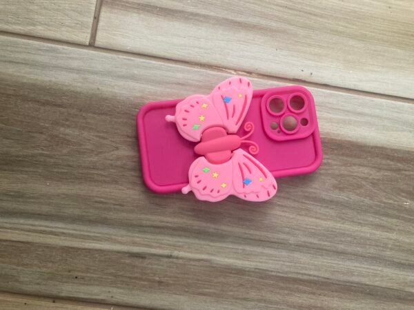 Cute Pink iPhone case for iPhone 13 Pro on wood-like tiles flooring