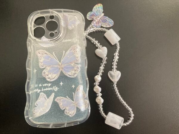 Light Blue Glitter TPU Butterfly Case with Strap Chain on a black table